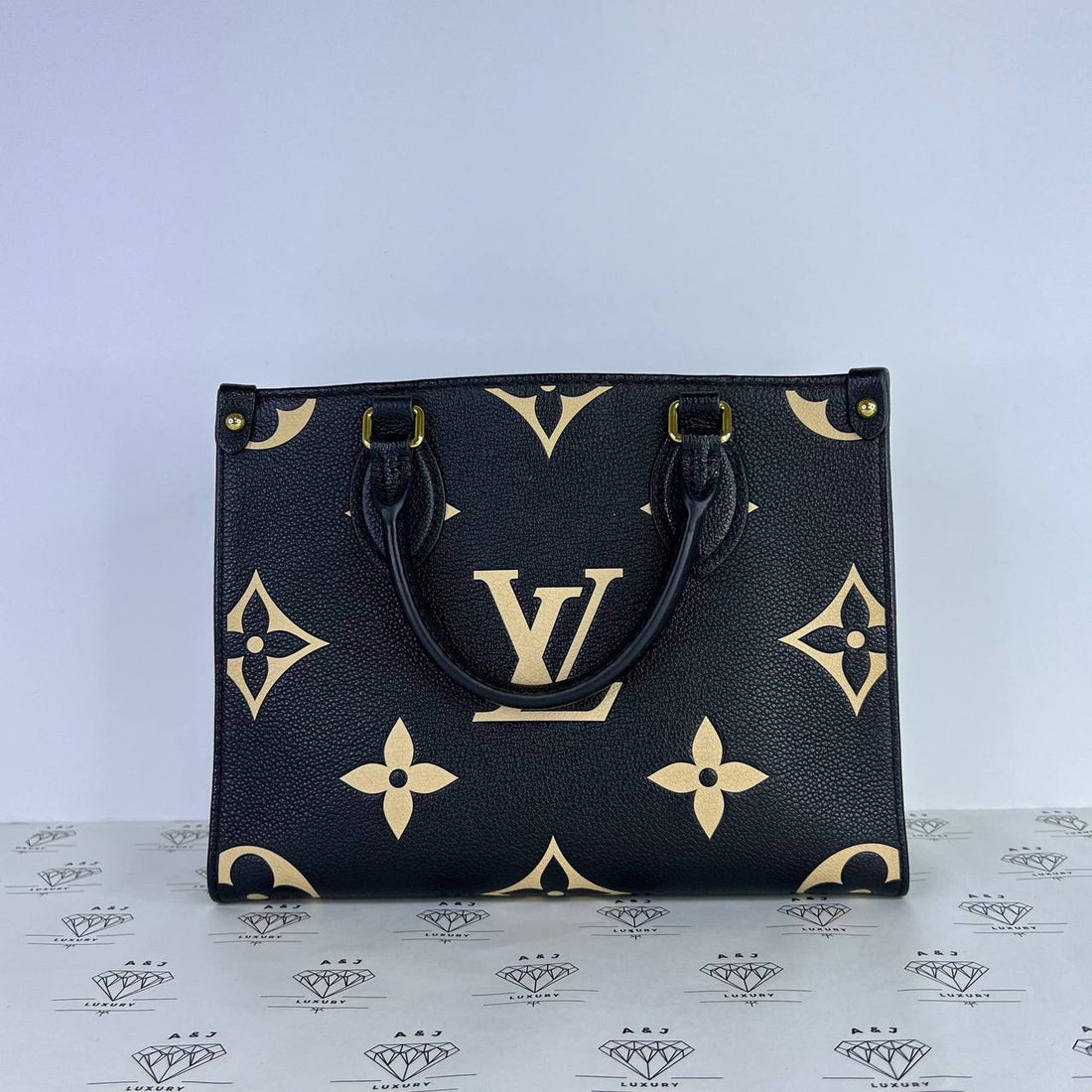 [PRE LOVED] Louis Vuitton OnTheGo PM in Black/Creme Bicolor Empreinte Leather GHW (microchipped)