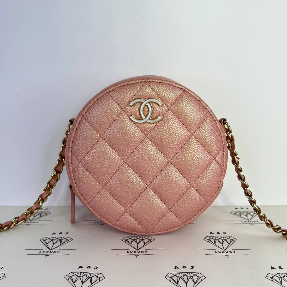[PRE LOVED] Chanel 19S Collection Round Clutch in Iridescent Pink Caviar Leather GHW (Series 27)