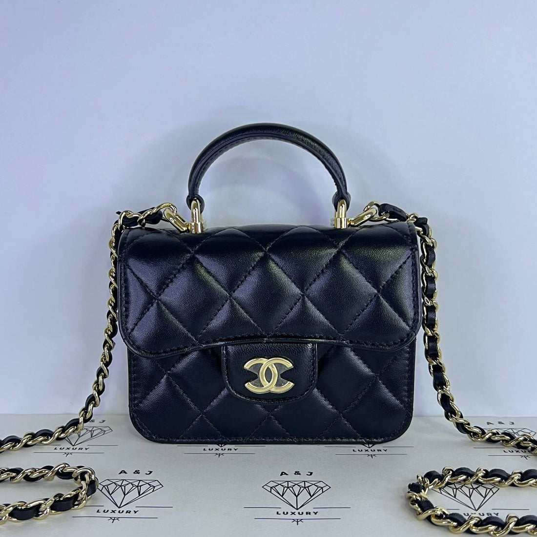 [PRE LOVED] Chanel Mini Top Handle Flap in Black Lambskin GHW (Series 31)