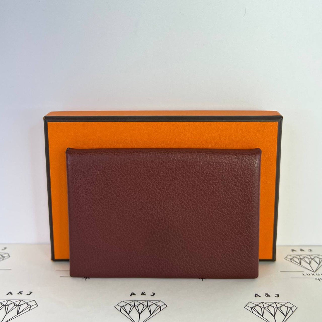 [PRE LOVED] Hermes Calvi Cardholder in Rouge H Evercolor Leather PHW (Stamp W - 2024)