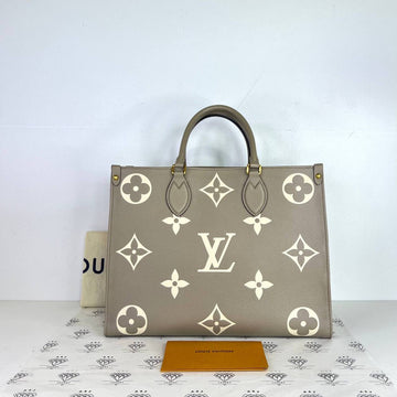 [PRE LOVED] Louis Vuitton OnTheGo MM in Tourterelle/Creme Bicolor Empreinte Leather (microchipped)