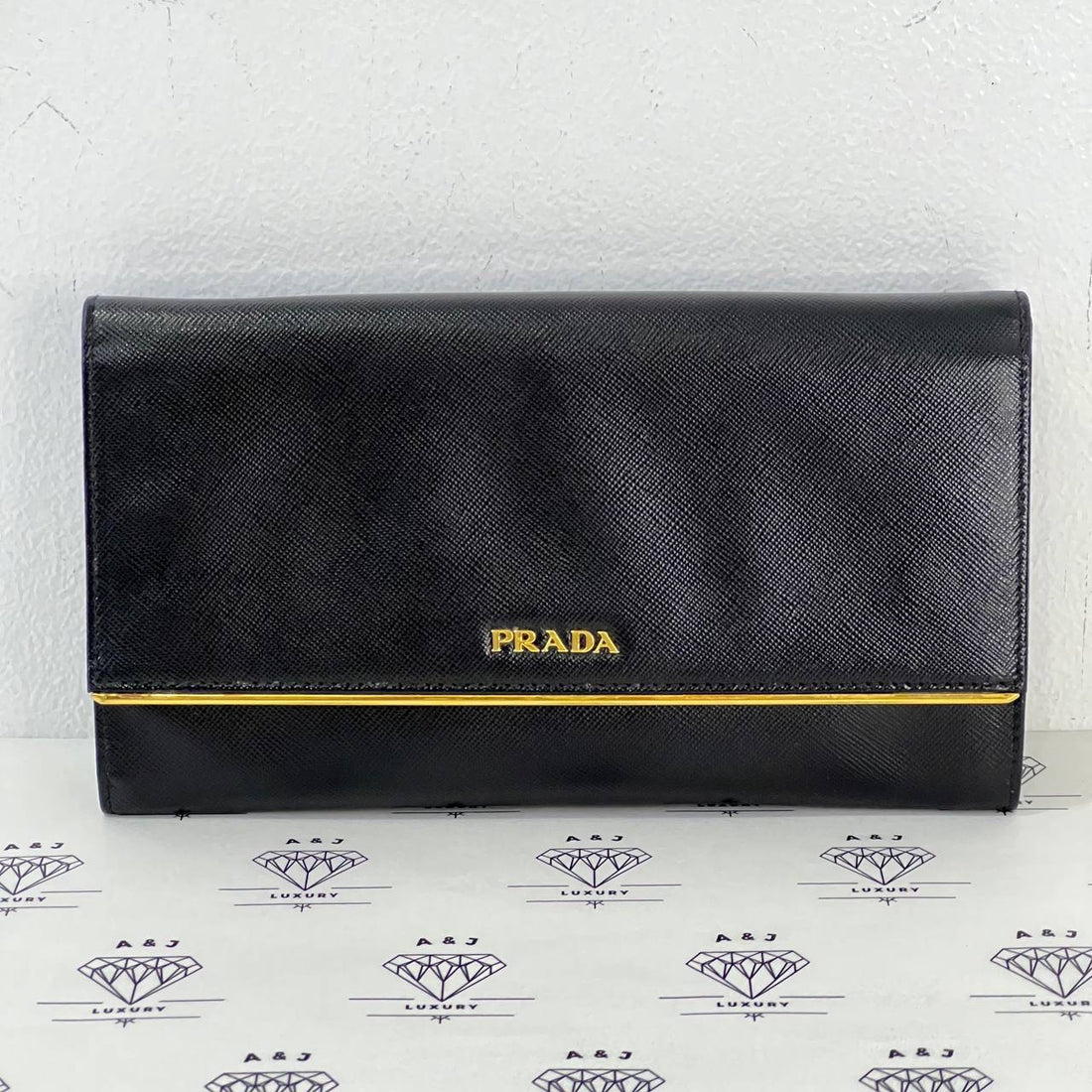 [PRE LOVED] Prada Logo-Plaque Continental Wallet in Black GHW