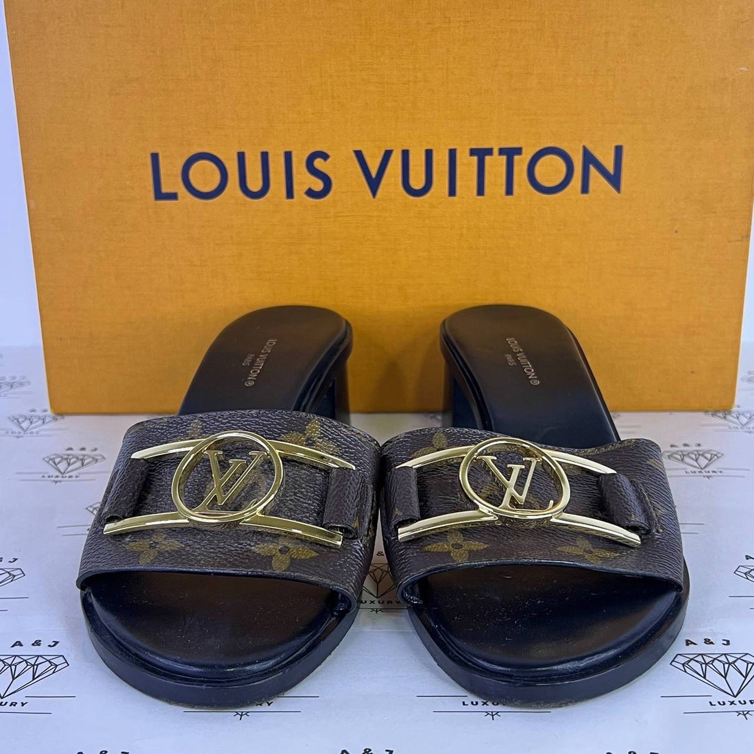 [PRE LOVED] Louis Vuitton Lock It Mules in Monogram Size 35EU