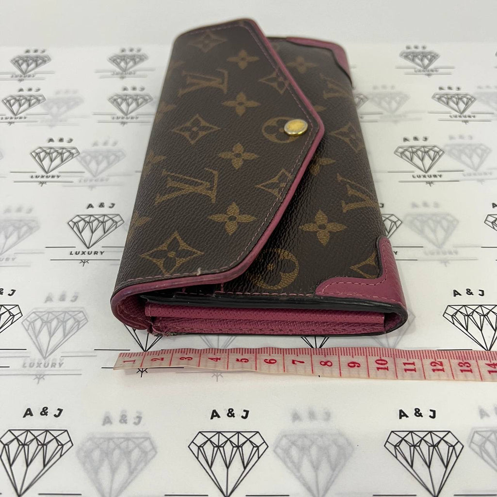 [PRE LOVED] Louis Vuitton Retiro Long Wallet in Monogram Fuchsia interior GHW