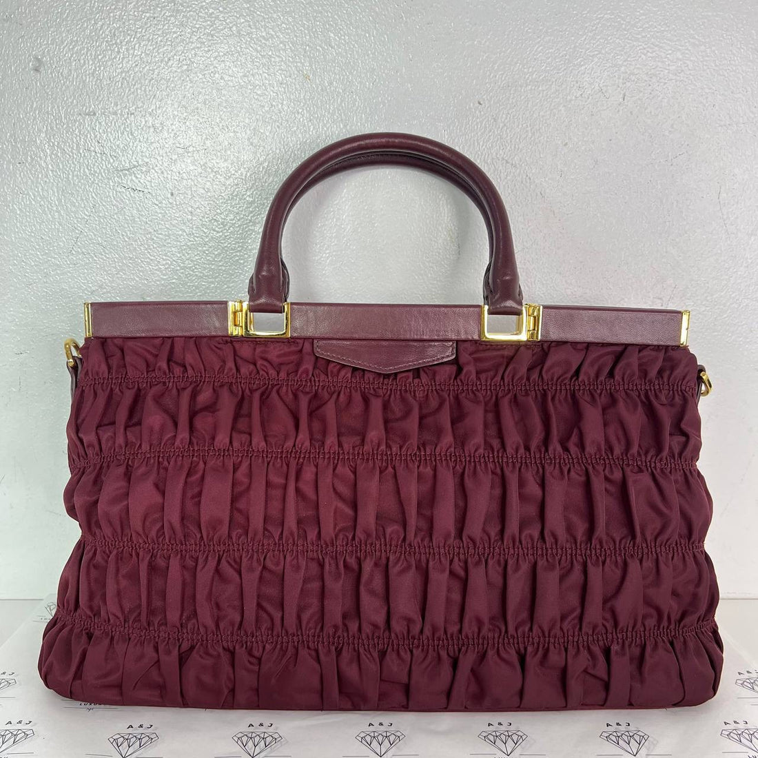 [PRE LOVED] Prada B2803Z Tessuto Gaufre Sling in Granato GHW