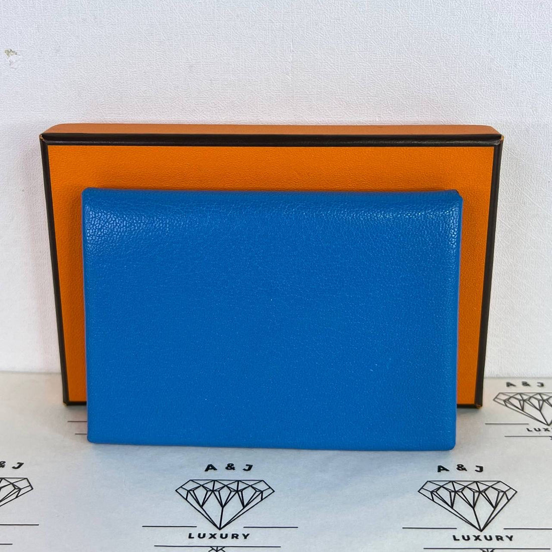 [PRE LOVED] Hermes Calvi Duo in Blue Chevre PHW (Stamp B - 2023)
