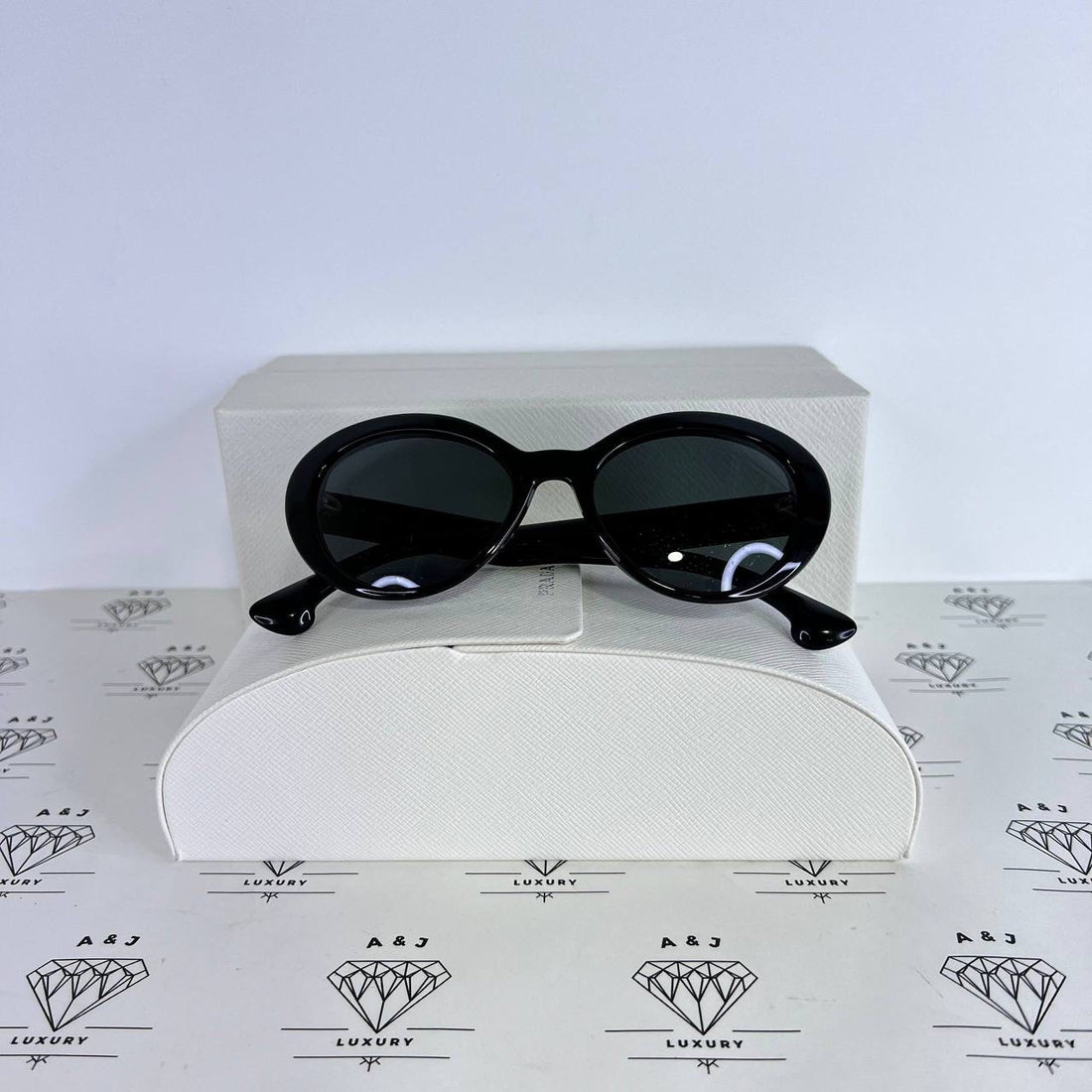 [PRE LOVED] Prada SPR15Q-F Round Sunglasses in Black