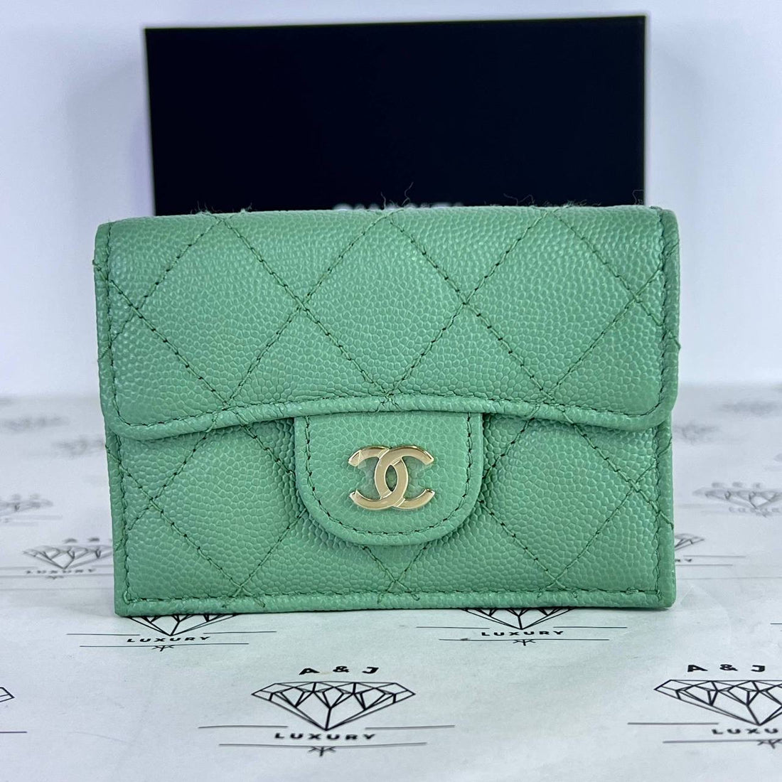 [PRE LOVED] Chanel Compact Trifold Wallet in Light Green Caviar Leather in Light Gold HW (microchipped)