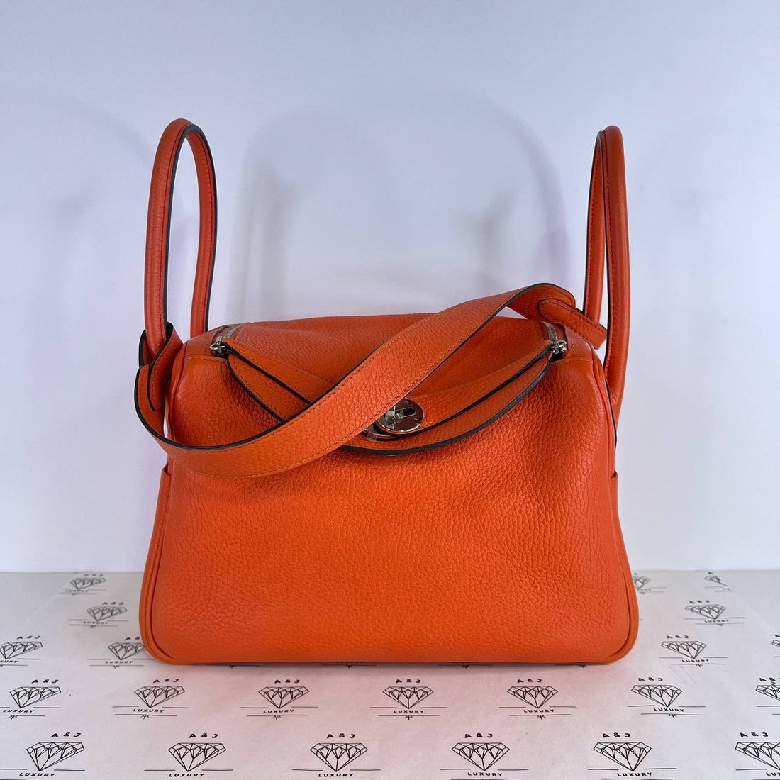 [PRE LOVED] Hermes Lindy 26 in Orange Clemence Leather PHW (Stamp A - 2017)