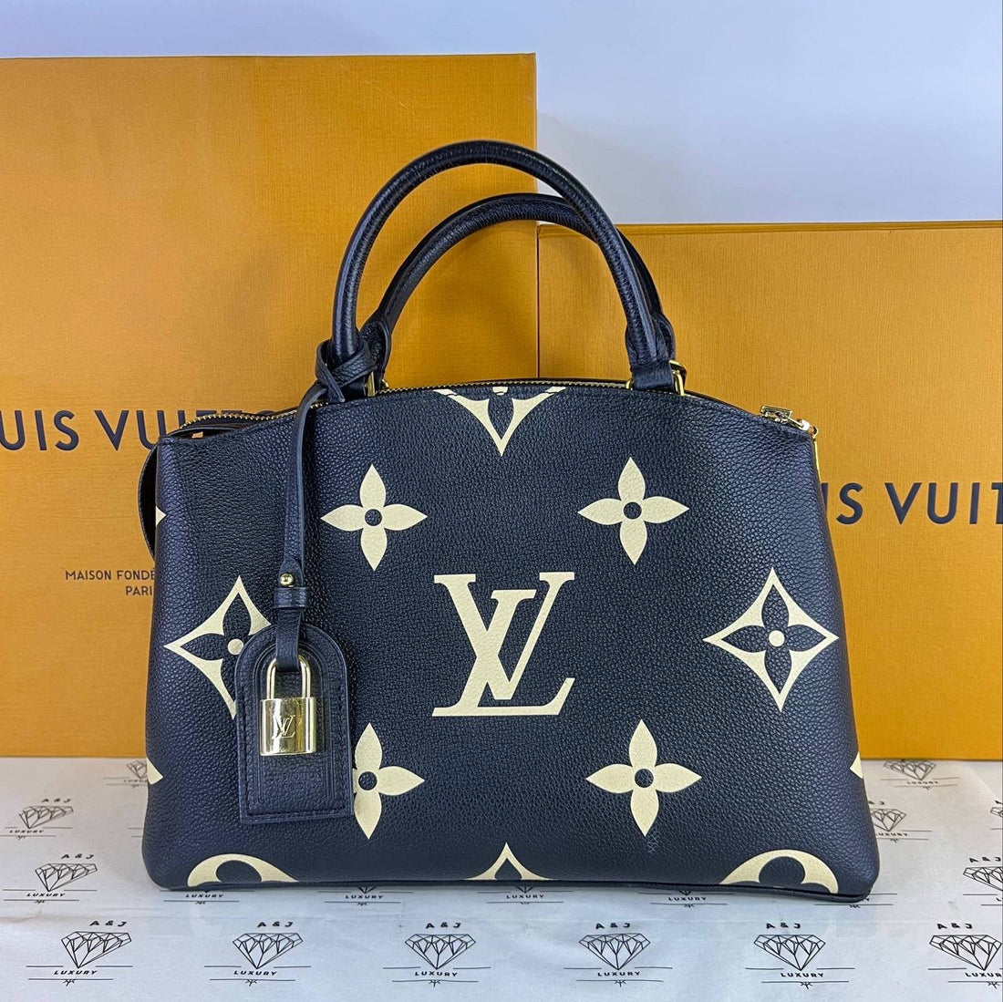 [PRE LOVED] Louis Vuitton Petite Palais PM in Black/Creme Bicolor Empreinte Leather GHW (microchipped)