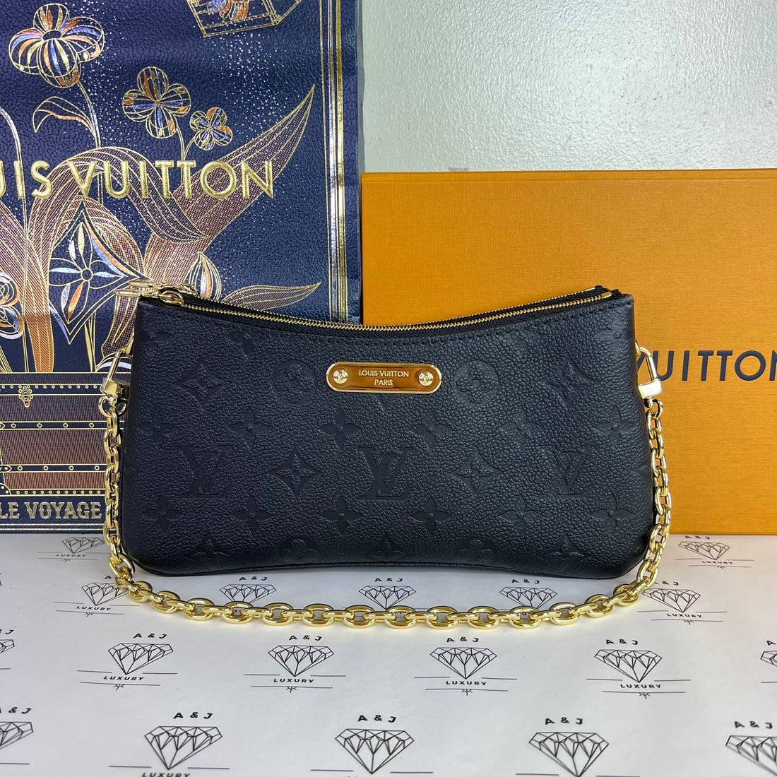 [PRE LOVED] Louis Vuitton Liv Pochette in Black Empreinte Leather GHW (microchipped)