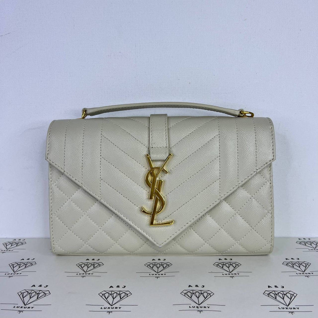 [PRE LOVED] YSL Small Envelope in White Grained Leather GHW
