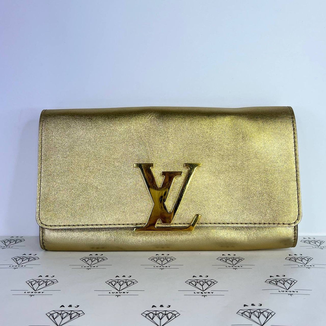 [PRE LOVED] Louis Vuitton Louise Clutch in Gold Metallic Calfskin Leather GHW (TR3114)