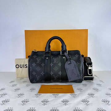 [PRE LOVED] Louis Vuitton Keepall Bandoulière 25 in Monogram Eclipse Reverse Canvass SHW (microchipped)