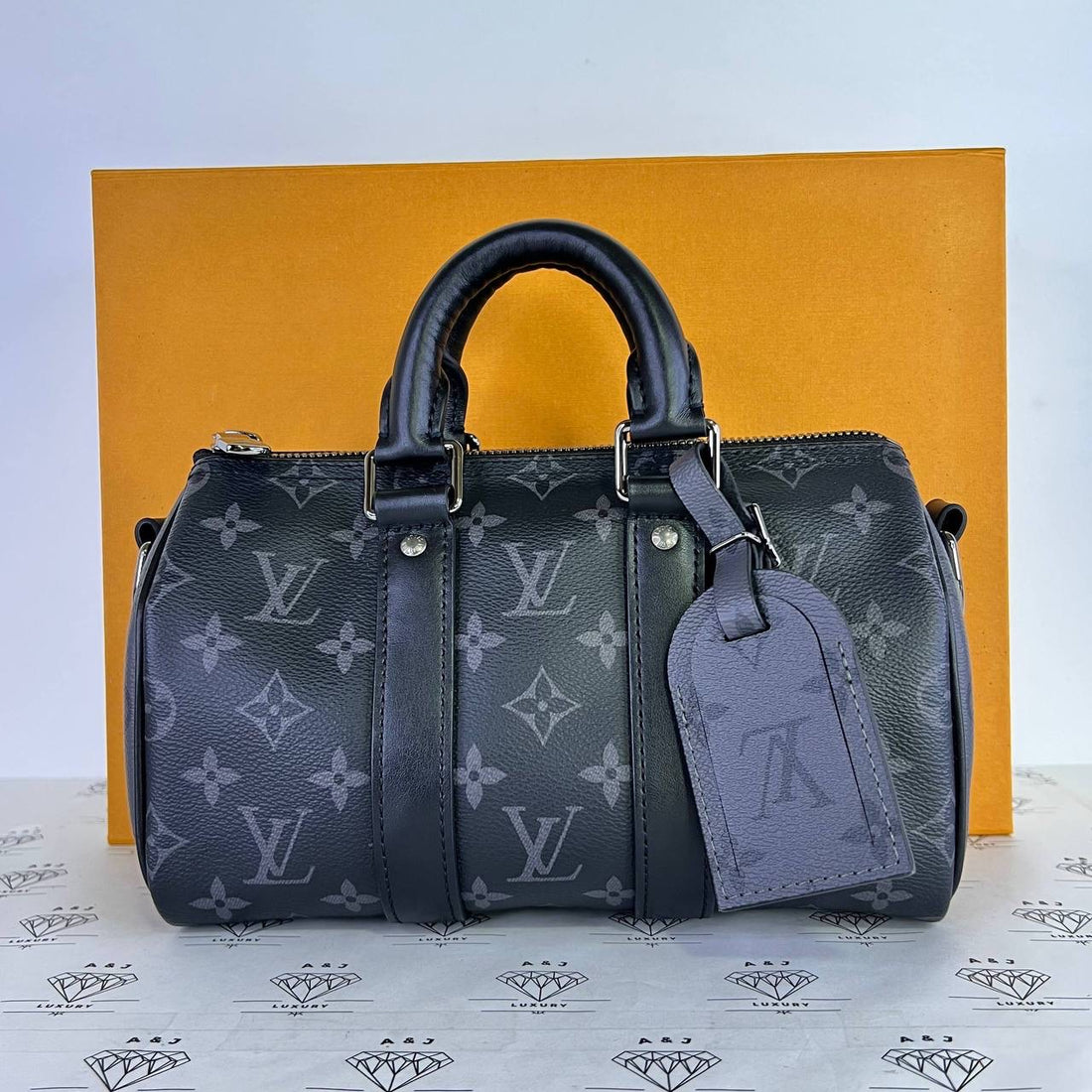 [PRE LOVED] Louis Vuitton Keepall Bandoulière 25 in Monogram Eclipse Reverse Canvass SHW (microchipped)
