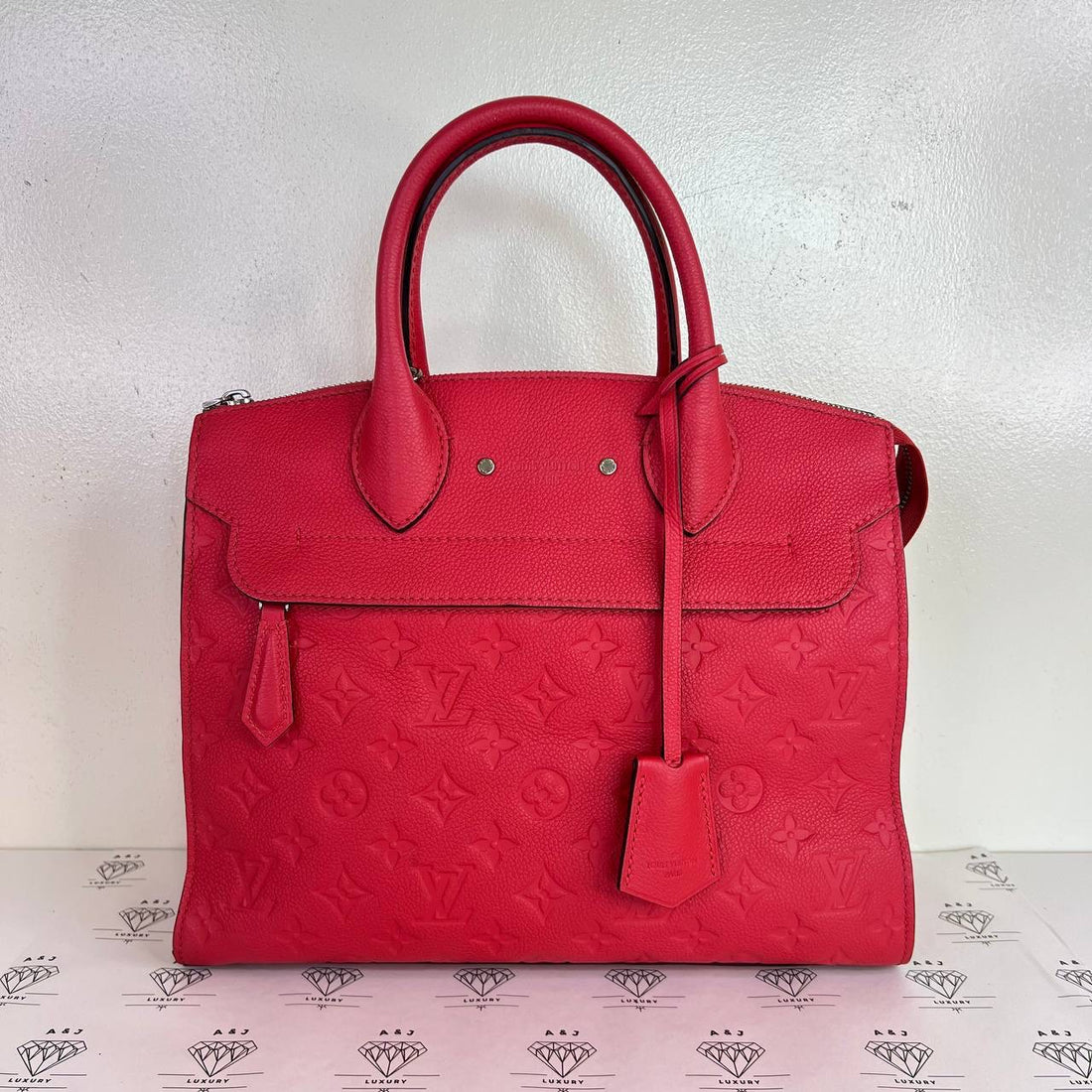 [PRE LOVED] Louis Vuitton Pont Neuf MM in Red Empreinte Leather (CA0186)