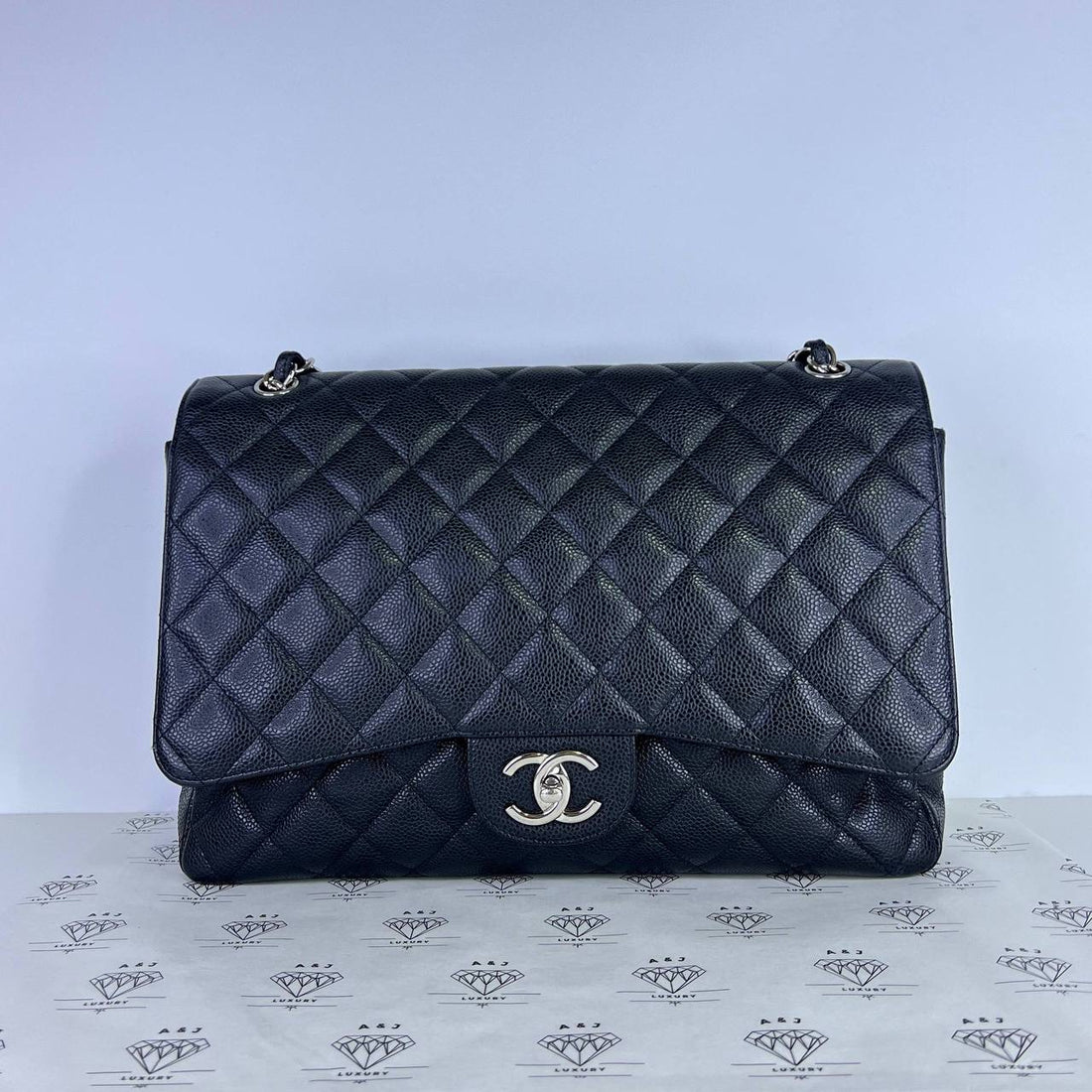 [PRE LOVED] Chanel Classic Maxi Double Flap in Black Caviar Leather SHW (Series 16)