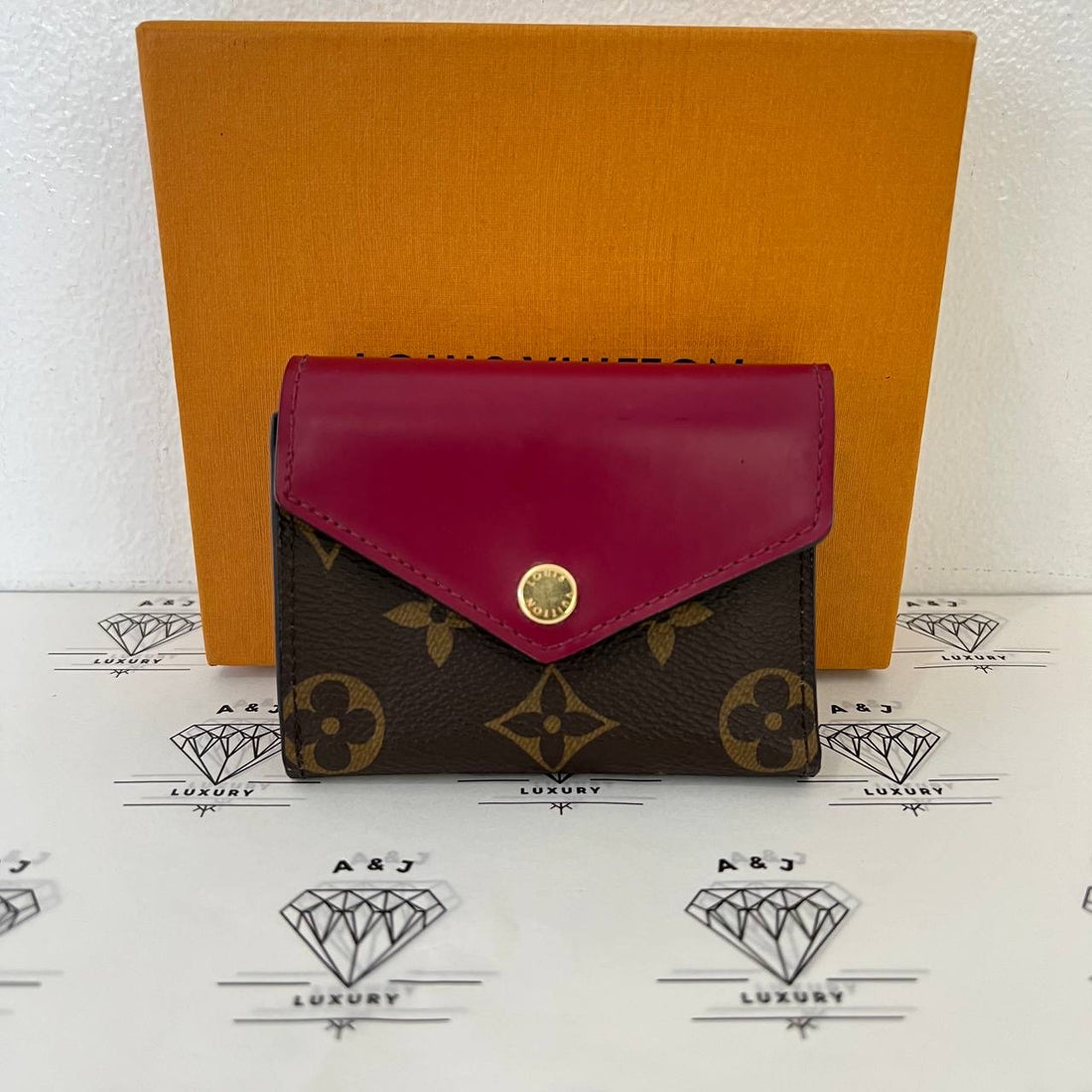 [PRE LOVED] Louis Vuitton Zoe Wallet in Monogram Fuchsia interior (MI2139)