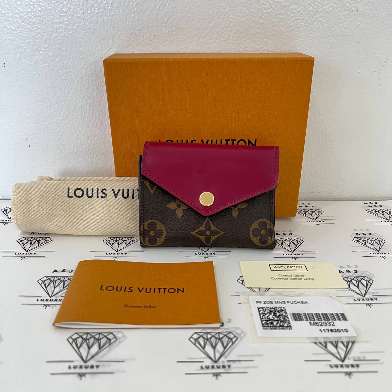 [PRE LOVED] Louis Vuitton Zoe Wallet in Monogram Fuchsia interior (MI2139)