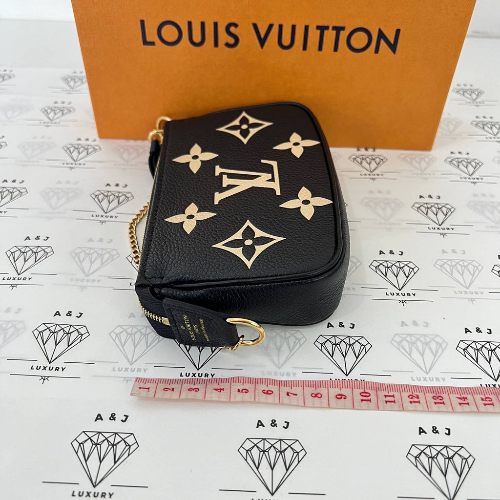 [PRE LOVED] Louis Vuitton Mini Pochette Accessoires in Black Bicolor Empreinte Leather (microchipped)