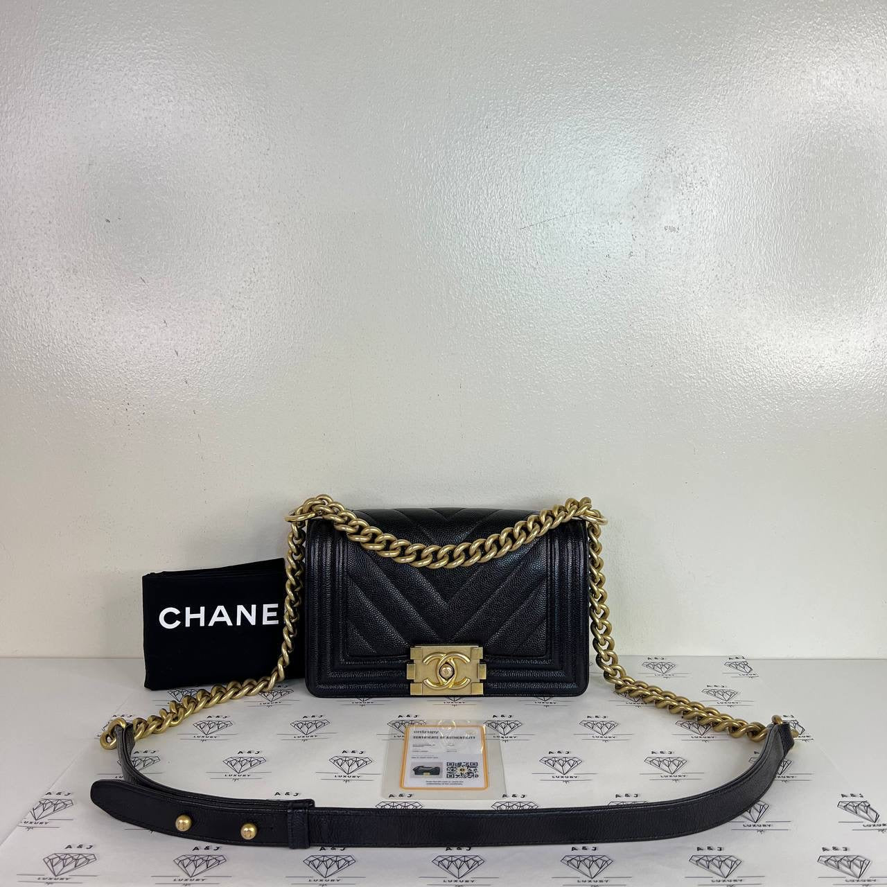 [PRE LOVED] Chanel Small Leboy Chevron in Black Caviar Aged Gold HW (Series 24)