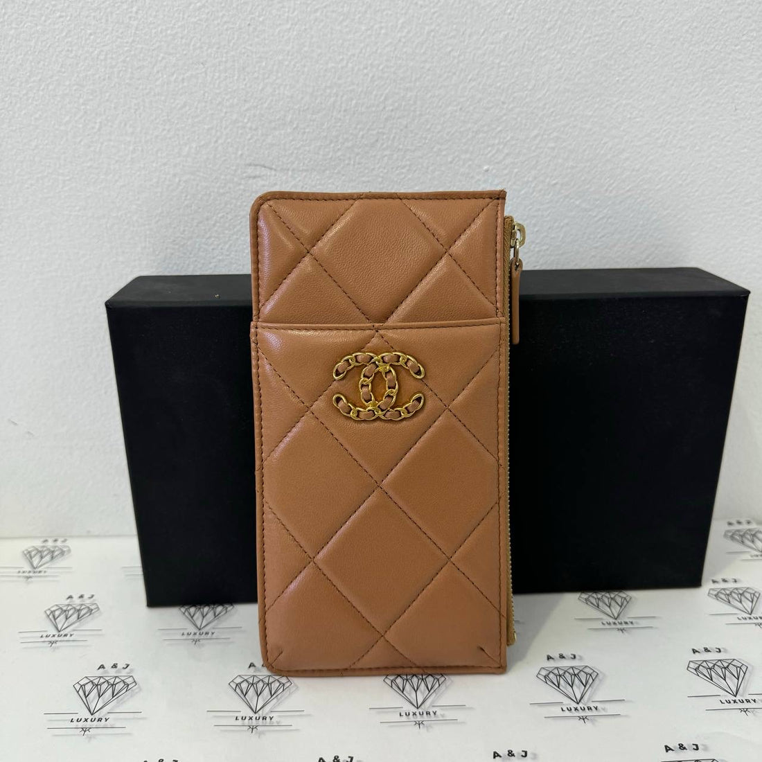 [PRE LOVED] Chanel C19 Phone Holder in Caramel Lamsbkin AGHW (Series 31)