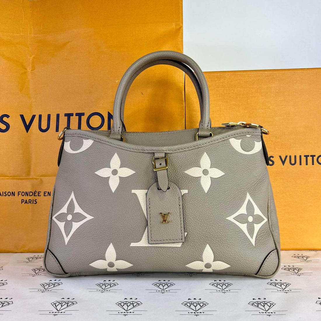 [PRE LOVED] Louis Vuitton Trianon PM in Tourterelle/Creme Bicolor Empreinte Leather GHW (microchipped)