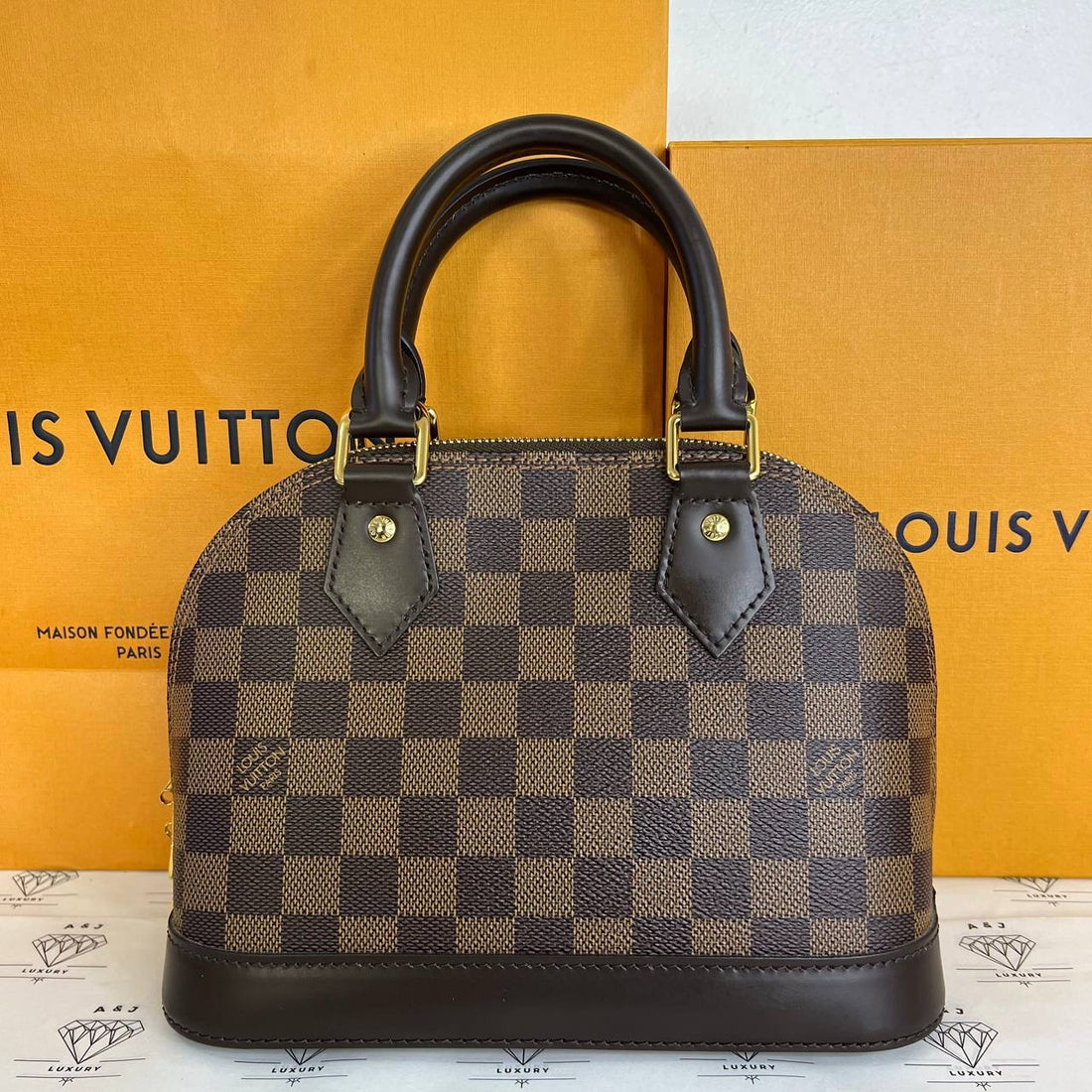 [PRE LOVED] Louis Vuitton Alma BB in Damier Ebene Canvass (microchipped)