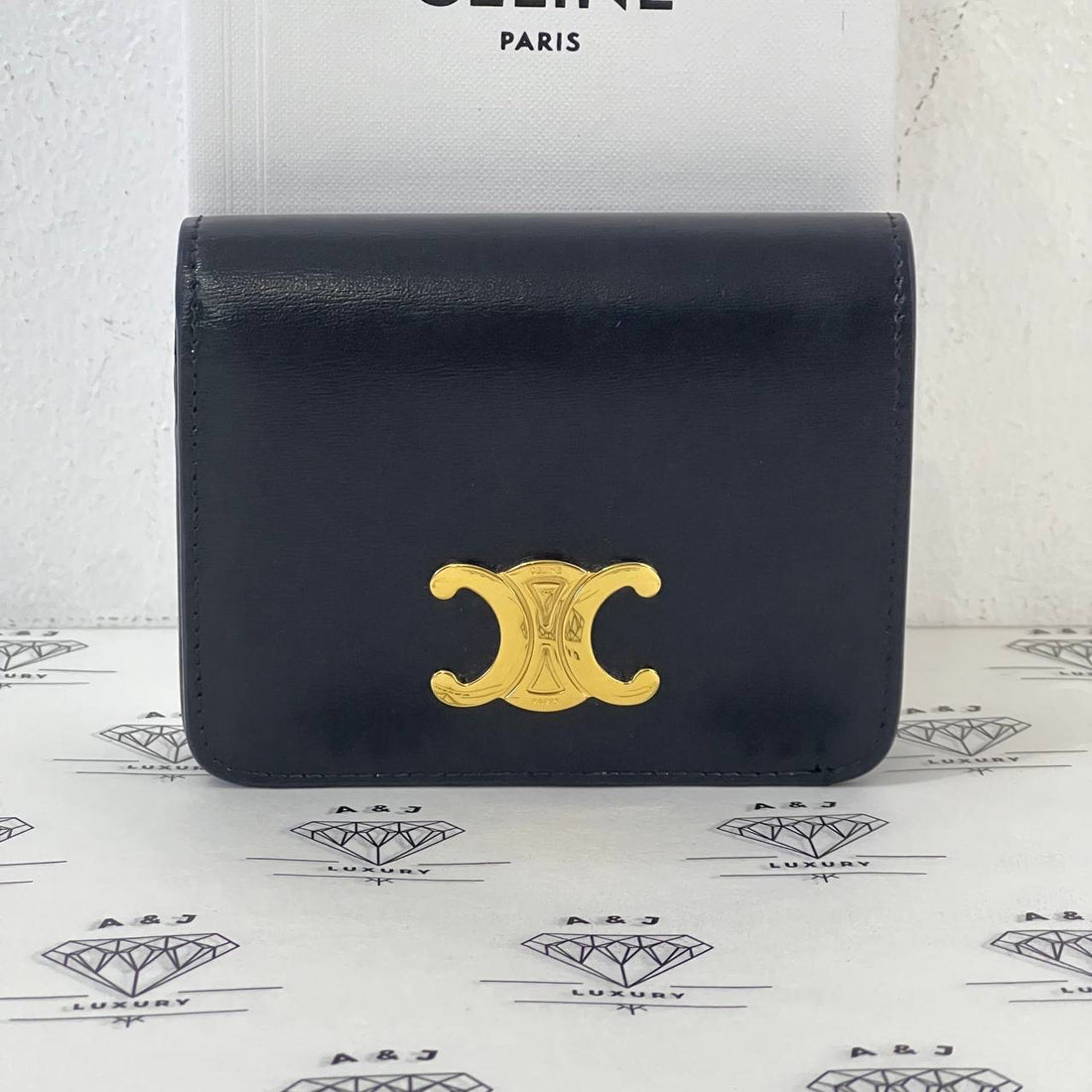 [PRE LOVED] Celine Triomphe Compact Wallet in Black Shiny Calfskin GHW