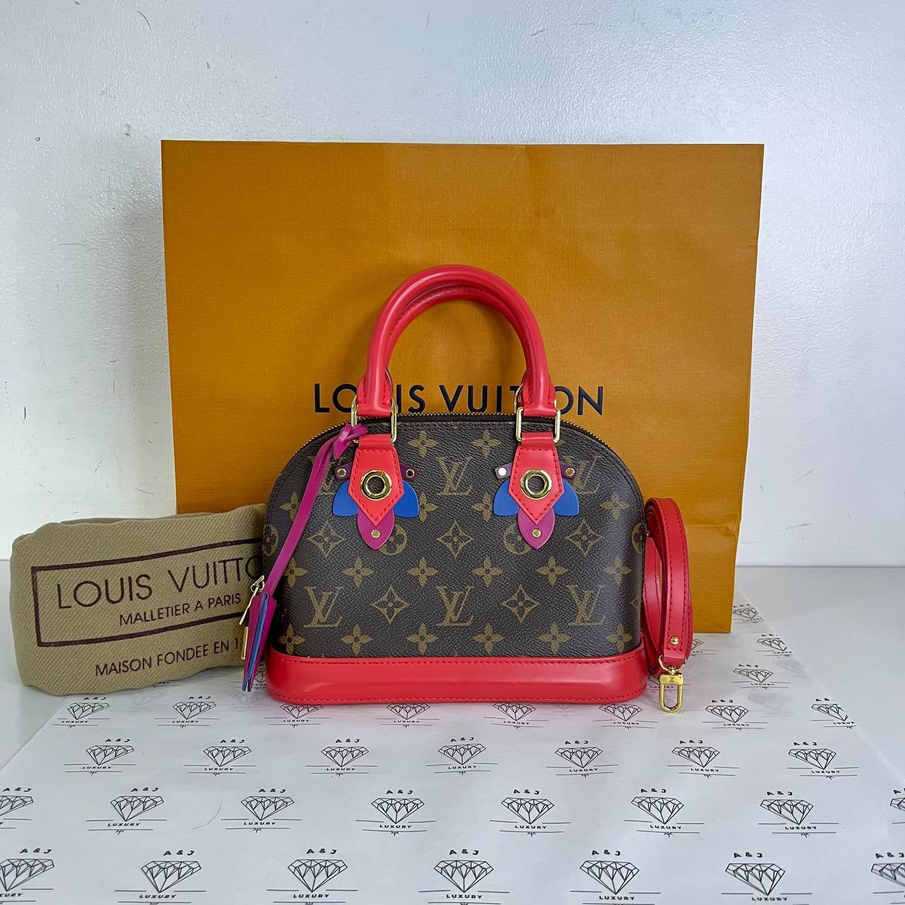 [PRE LOVED] Louis Vuitton Totem Alma BB in Monogram Canvass with pink trims (FL3155)