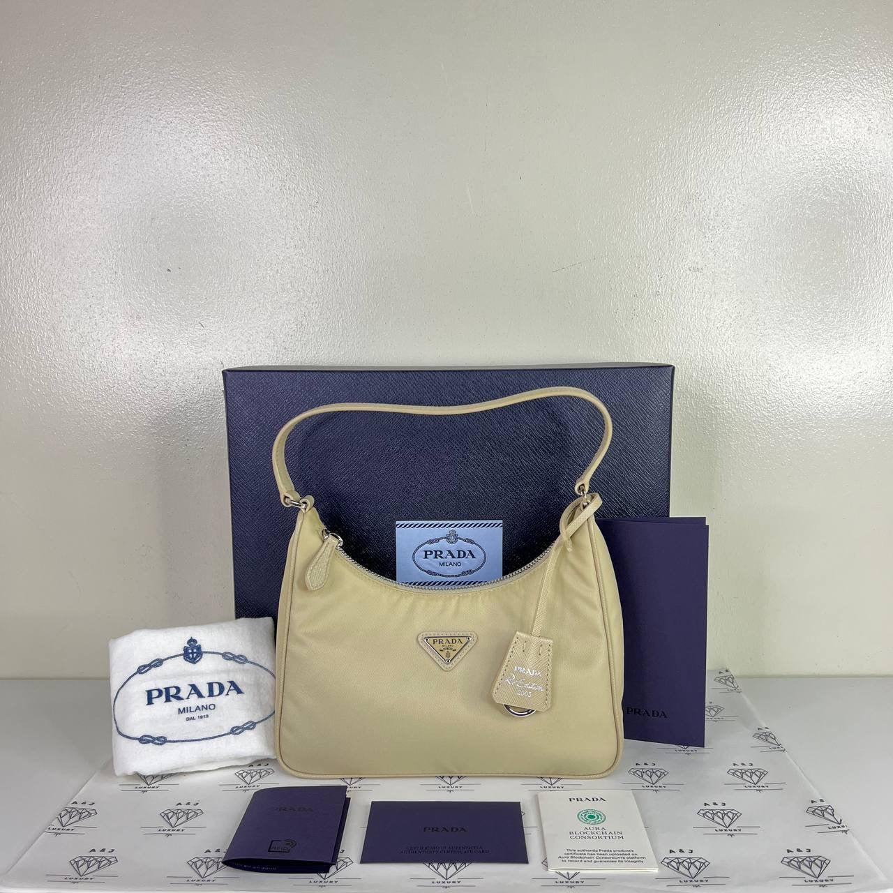 [PRE LOVED] Prada Re-edition 2005 Shoulder Bag in Beige Nylon SHW