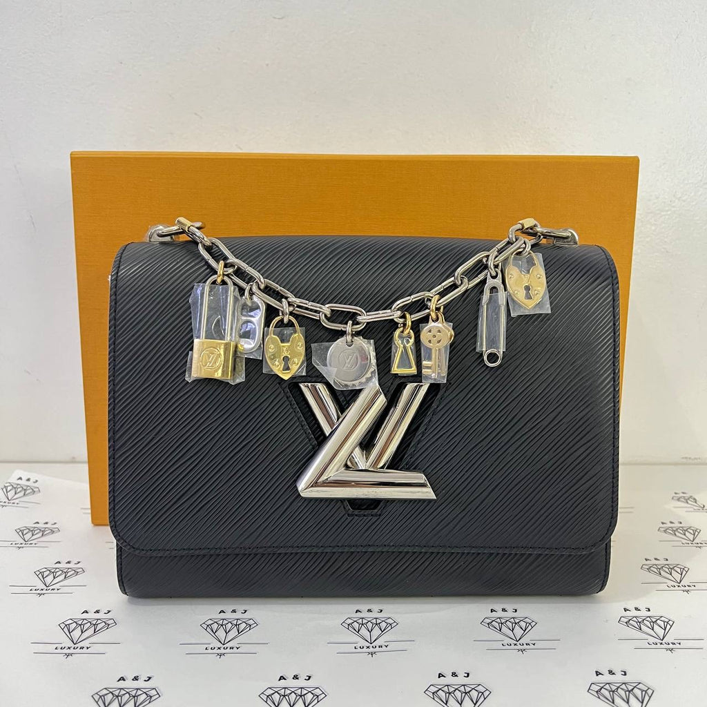 [PRE LOVED] Louis Vuitton Twist MM Lock Charms in White and Black Epi Leather SHW (microchipped)