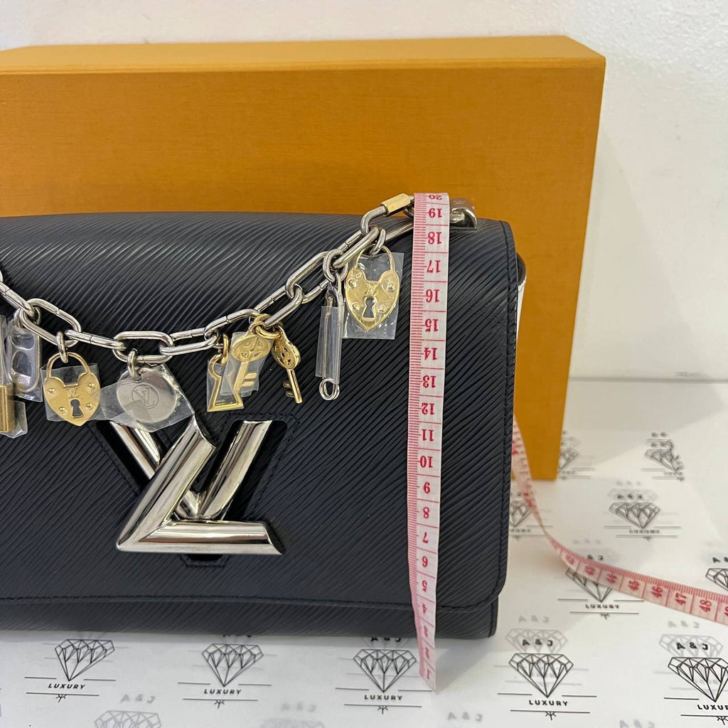 [PRE LOVED] Louis Vuitton Twist MM Lock Charms in White and Black Epi Leather SHW (microchipped)