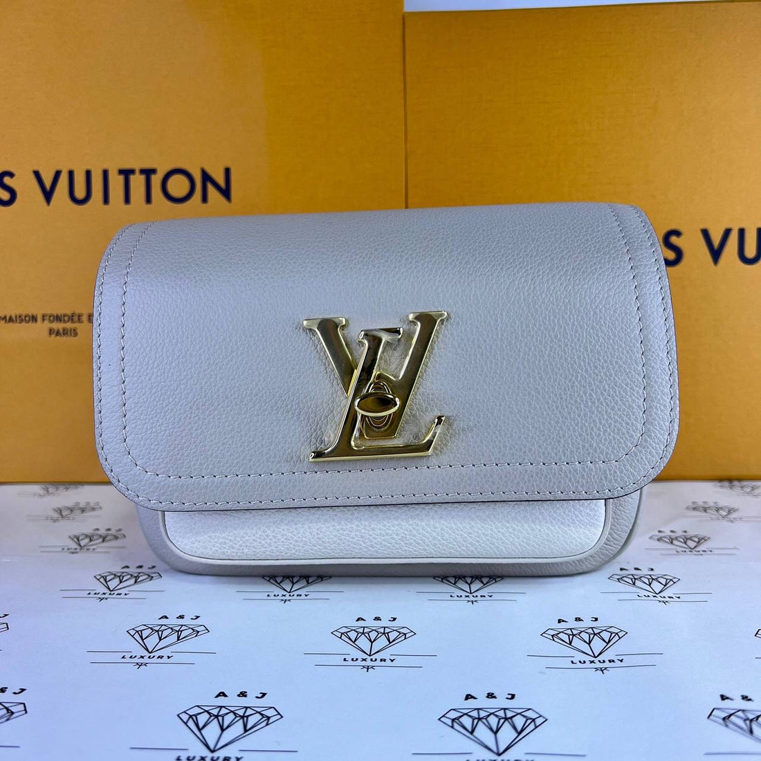 [PRE LOVED] Louis Vuitton Lockme Tender in Gray Grained Calf Leather GHW (microchipped)