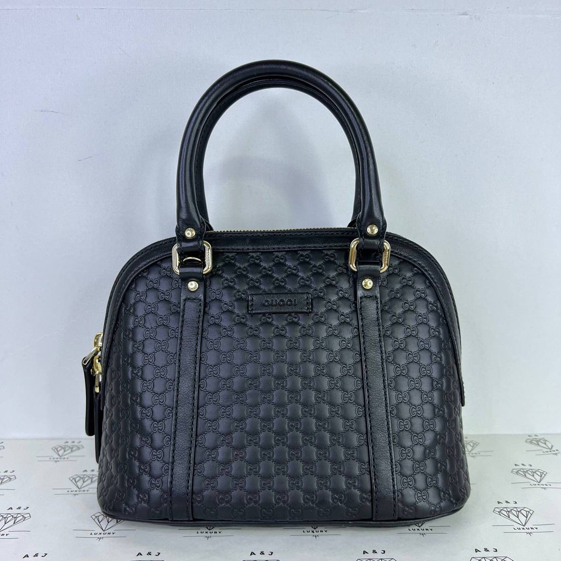 [PRE LOVED] Gucci Microguccissima Dome Top Handle in Black GHW