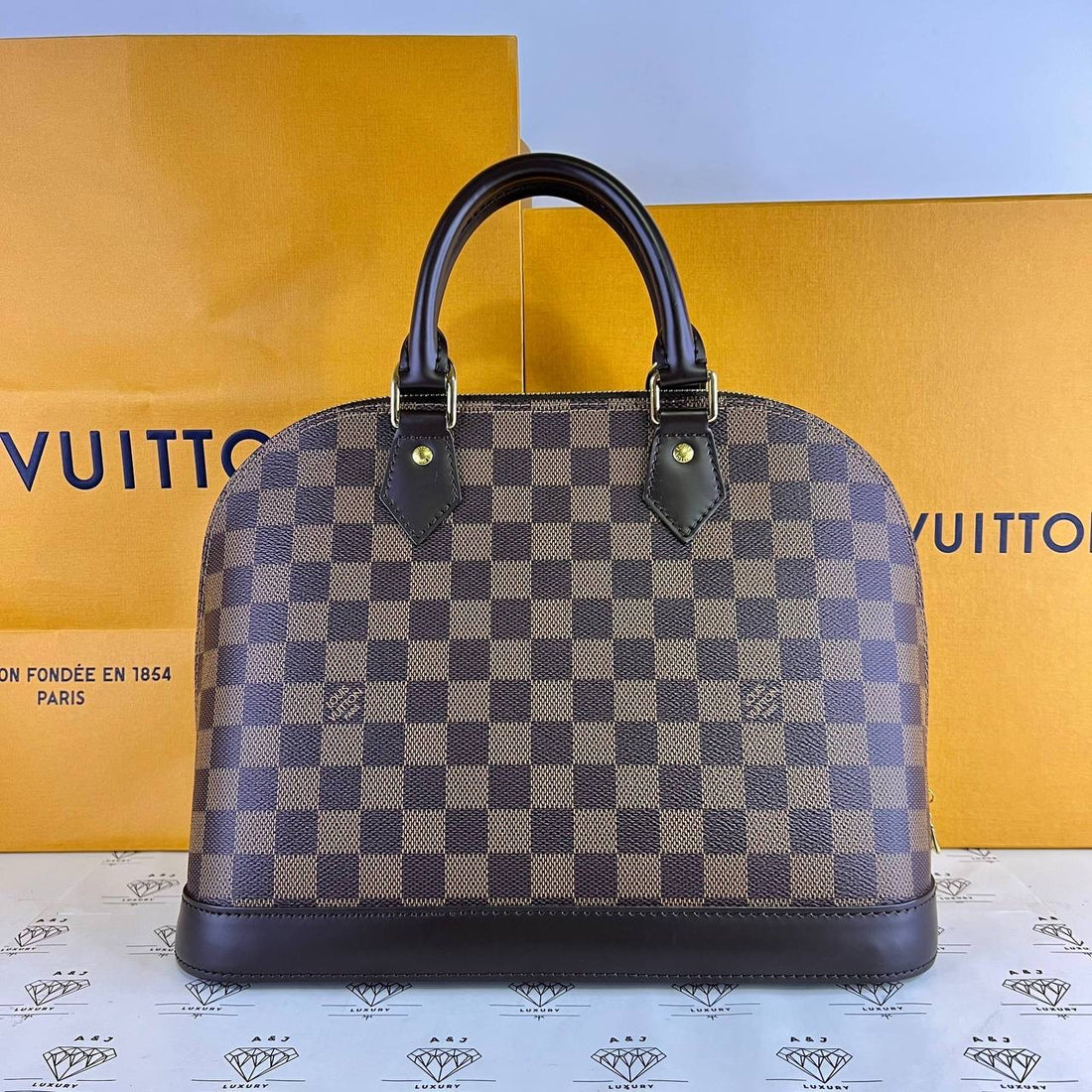 [PRE LOVED] Louis Vuitton Alma PM in Damier Ebene Canvass (microchipped)