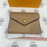 [PRE LOVED] Louis Vuitton Victorine Wallet in Beige Empreinte Leather GHW (SP5107)