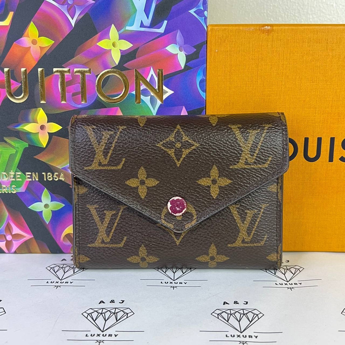 [PRE LOVED] Louis Vuitton Victorine in Monogram Fuchsia interior (MI5129)
