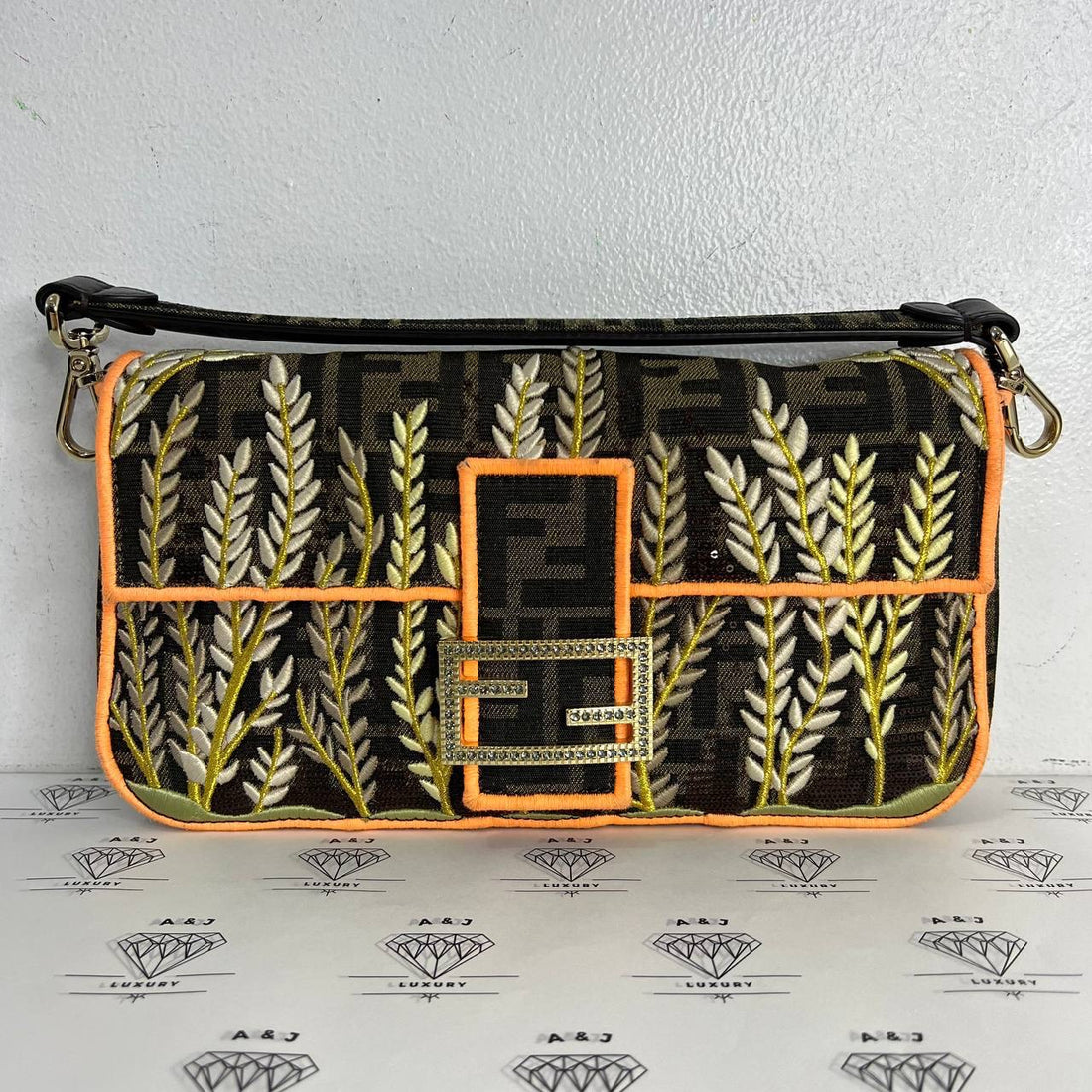 [PRE LOVED] Fendi Baguette in Brown Canvass with Leaves GHW