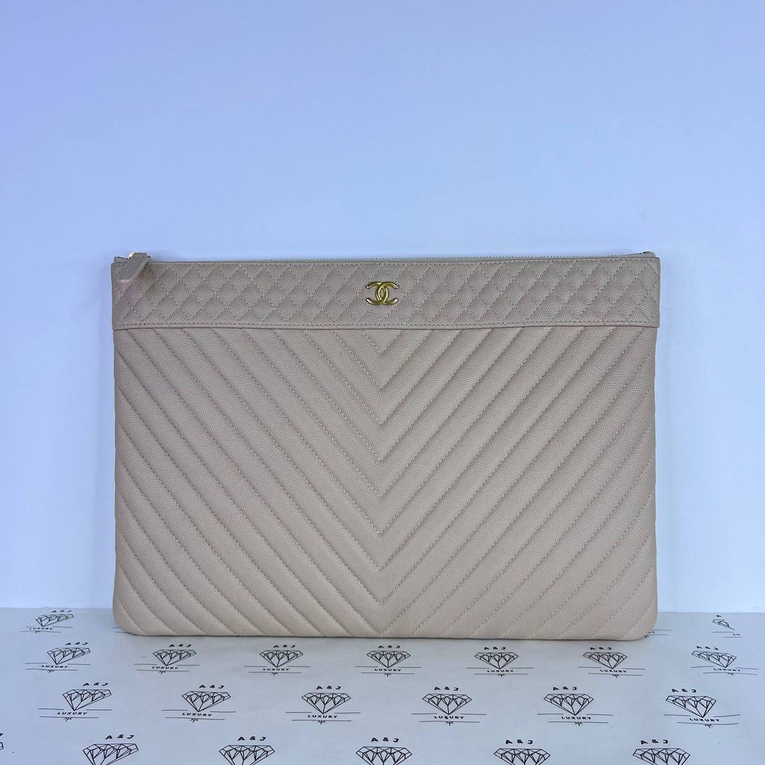 [PRE LOVED] Chanel Large O Case in Pink Beige Caviar Leather Aged Gold HW (Series 24)