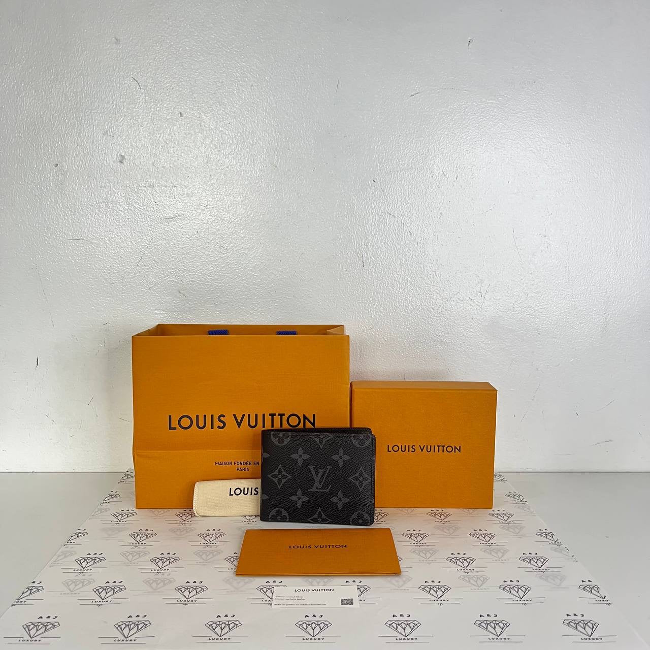 [PRE LOVED] Louis Vuitton Multiple Wallet in Monogram Eclipse (microchipped)