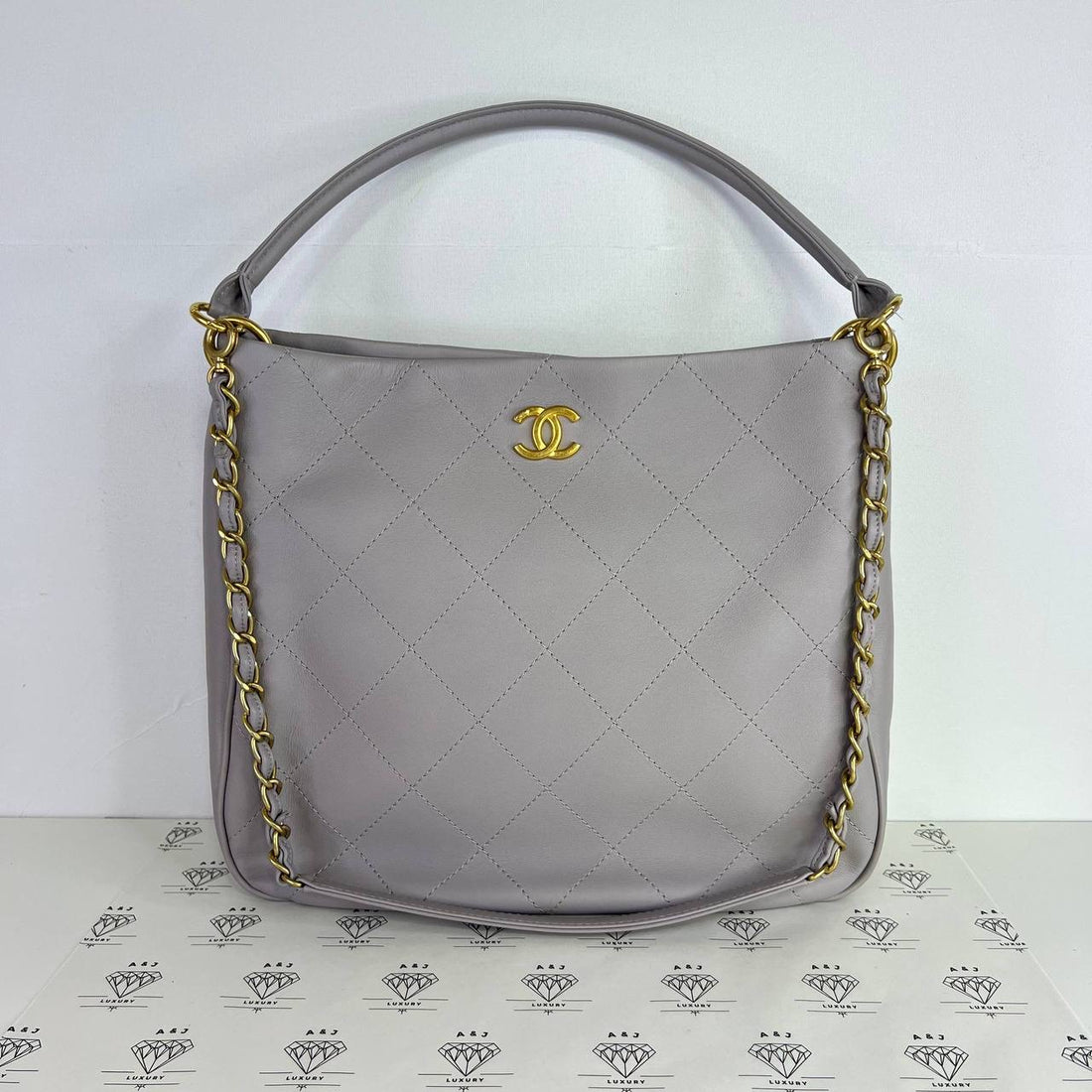 [PRE LOVED] Chanel Hobo Shoulder Bag in Light Gray Calfskin Leather Aged Gold HW (microchipped)