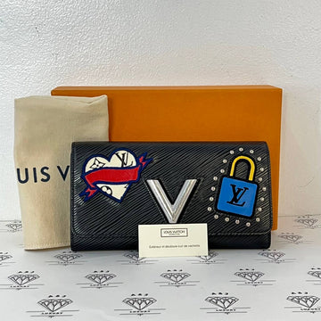 [PRE LOVED] Louis Vuitton Twist Wallet with travel patches in Black Epi Leather SHW (TN3178)