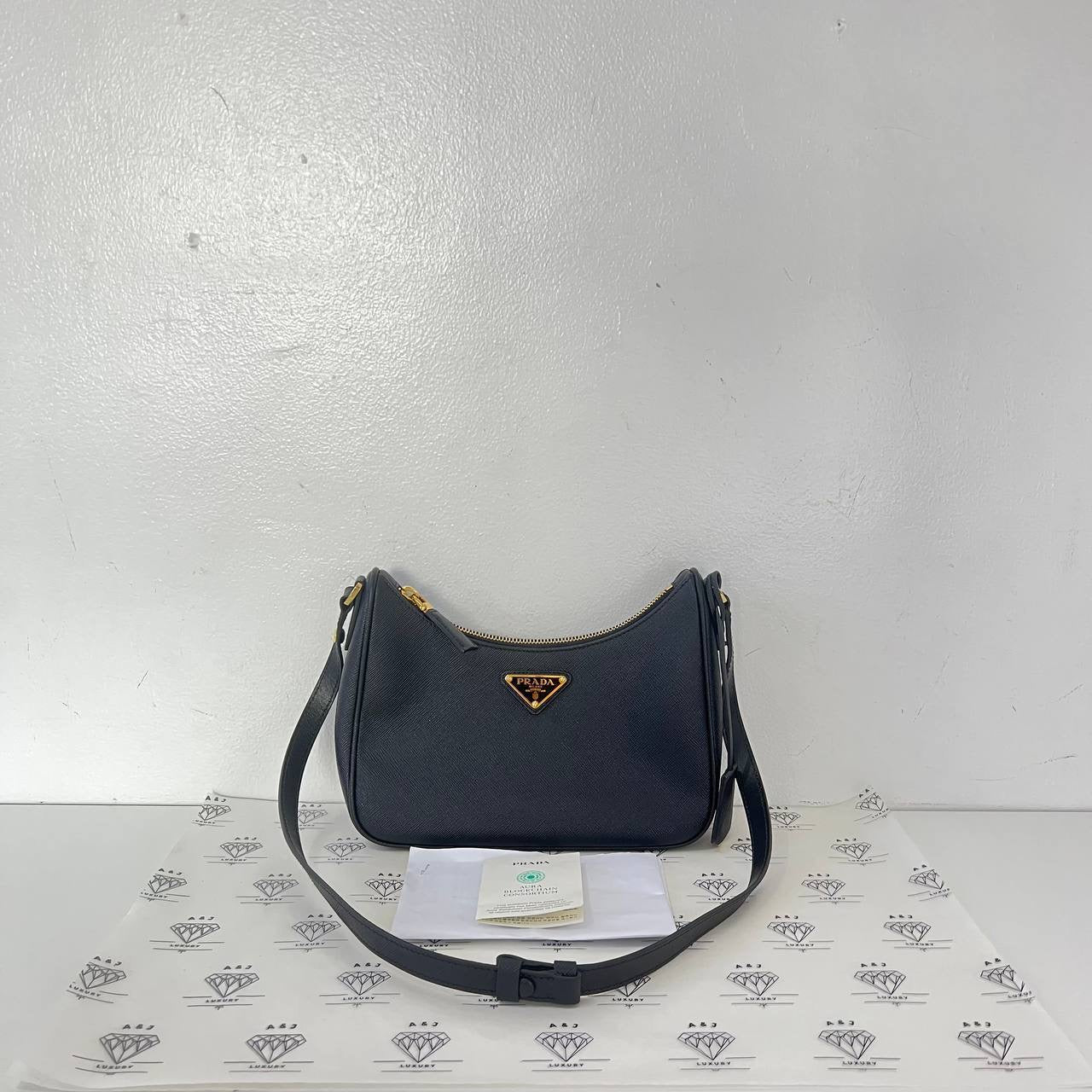 [PRE LOVED] Prada Re-edition 2005 in Black Saffiano Leather GHW