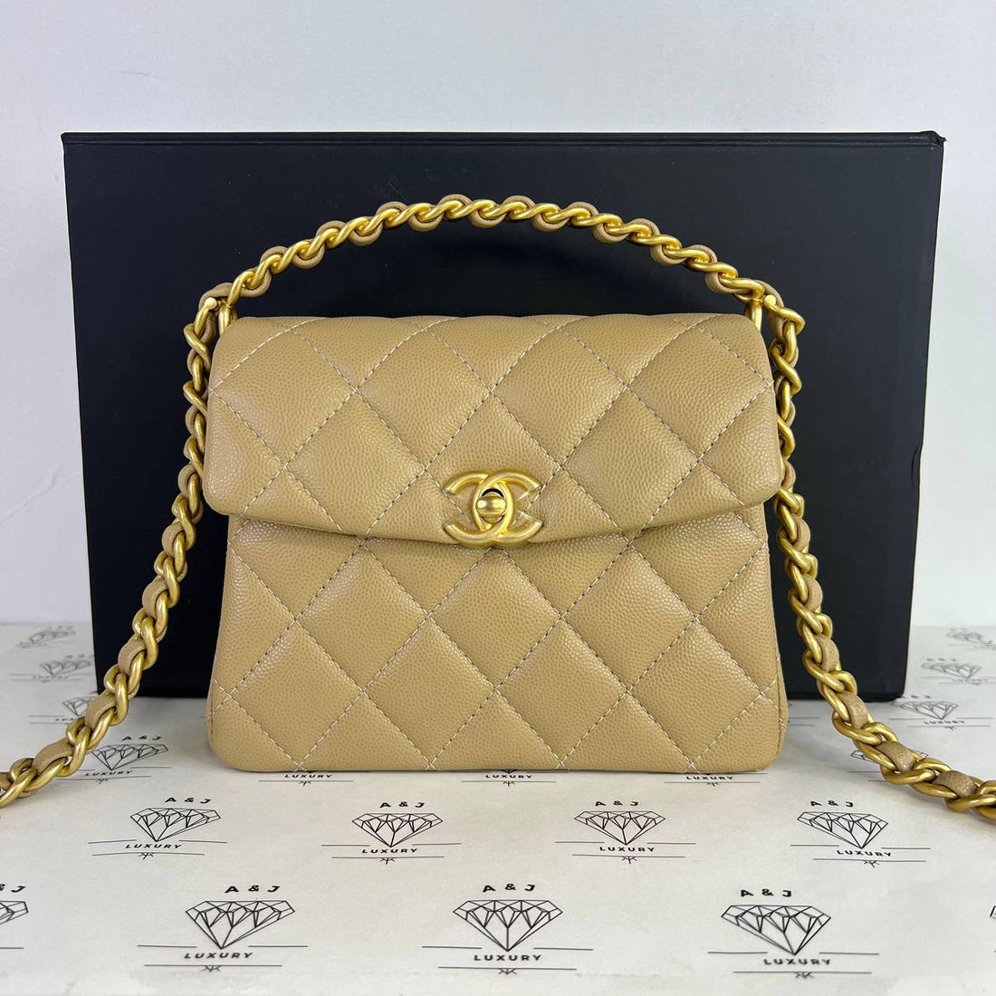 [PRE LOVED] Chanel 24S Collection 31 Rue Cambon Top Handle Bag in Dark Beige Caviar Leather GHW (microchipped)