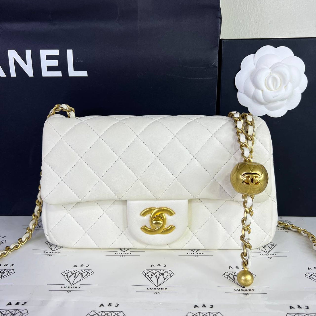 [PRE LOVED] Chanel Mini Rectangle Flap Pearl Crush Adjustable strap in White Lambskin Leather Aged Gold HW (microchipped)