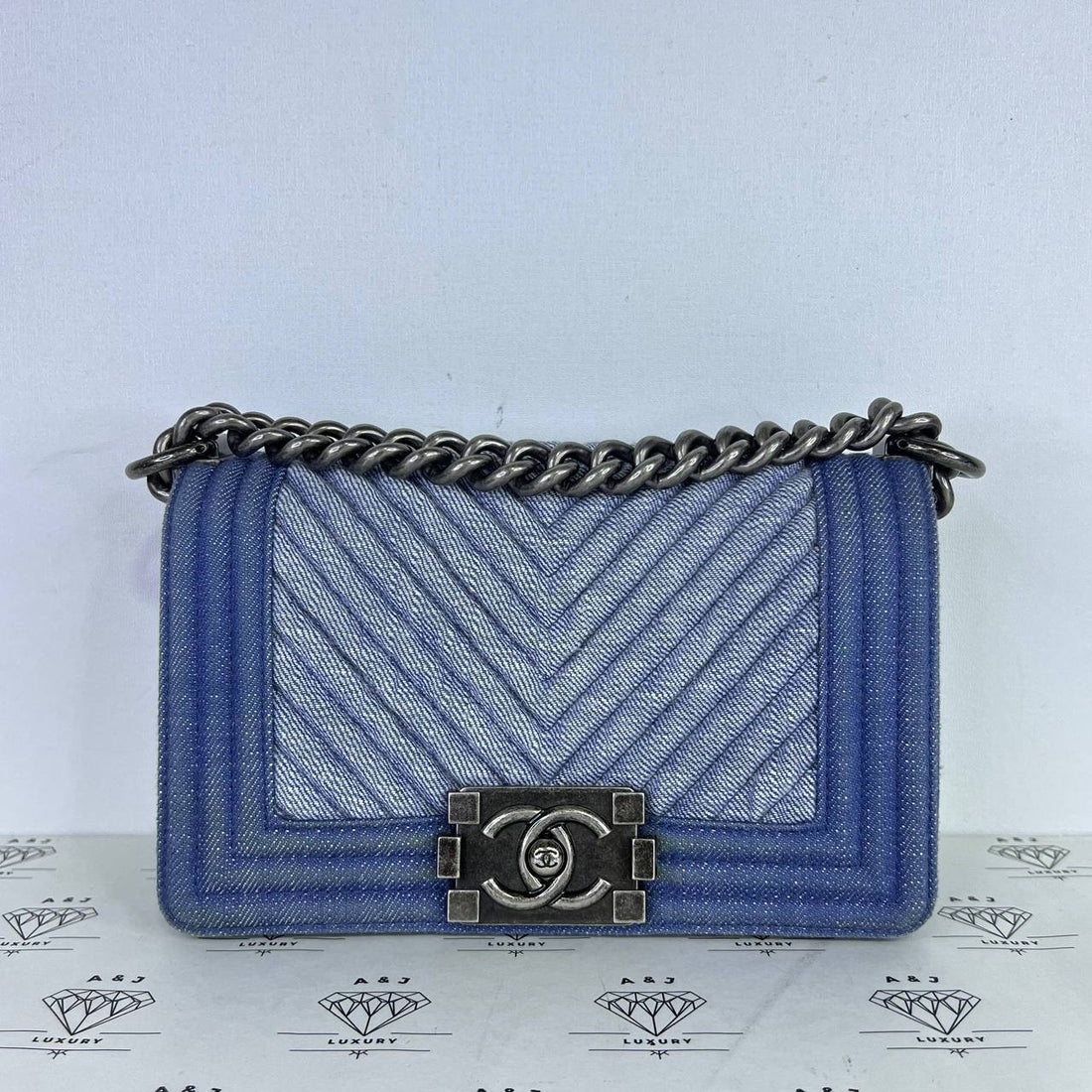 [PRE LOVED] Chanel Small Chevron Leboy in Denim RHW (Series 20)