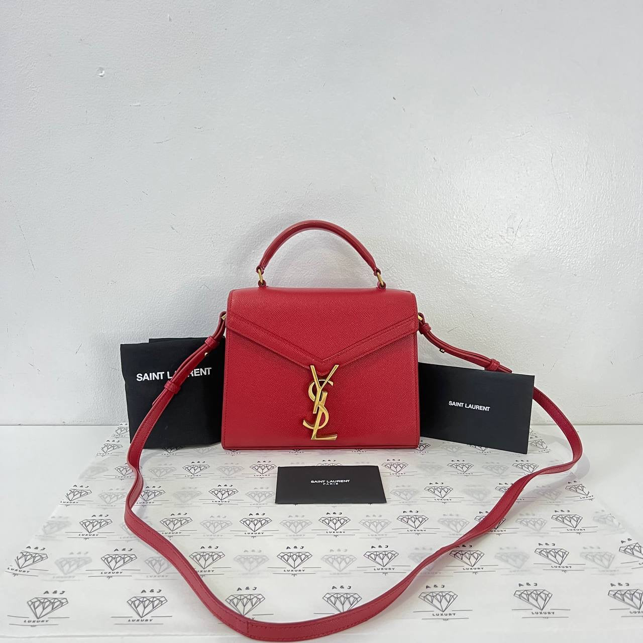 [PRE LOVED] YSL Mini Cassandra Top Handle in Red Grain De Poudre Leather GHW