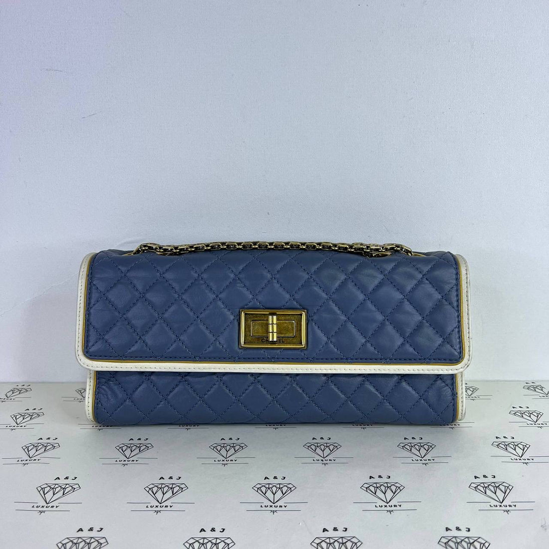 [PRE LOVED] Chanel Reissue 2.55 East West in Blue/White/Yellow Crinkled Calfskin Leather Aged Gold HW (Series 17)