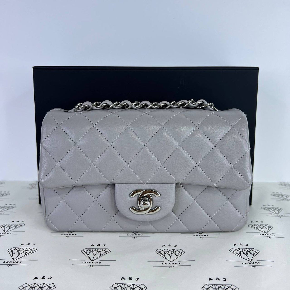 [PRE LOVED] Chanel Mini Rectangle Flap in Light Gray Lambskin Leather SHW (microchipped)
